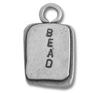 Silver rectangular bead charm stamped "BEAD
