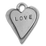 Metal heart pendant stamped with LOVE