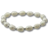 Oval white beaded bracelet with silver spacers