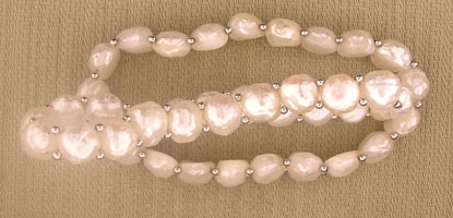 Pink baroque pearl necklace with silver spacers