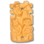 Carved wooden tiki totem with faces
