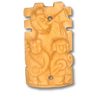 Carved wooden tiki totem with faces
