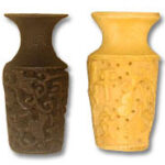 Two carved ornamental vases, brown and yellow