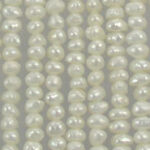 Close-up of cream-colored pearl strands