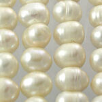 Close-up of ivory freshwater pearl strands
