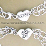 Two silver heart charm bracelets with love