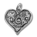 Ornate silver filigree heart pendant