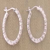 Pair of textured silver hoop earrings