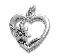 Silver heart-shaped pendant with flower