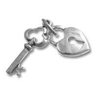 Silver key and heart-shaped padlock charm