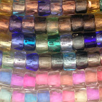 Colorful iridescent square glass beads in rows