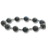 Dark stone bead bracelet on white background