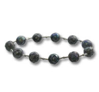 Dark stone bead bracelet on white background