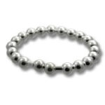 Shiny silver beaded bracelet on white background