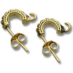 pair of ornate gold stud earrings