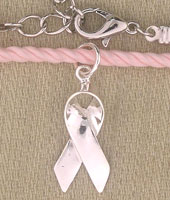 Silver breast cancer ribbon charm on pink bracelet