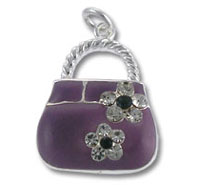 Purple handbag charm with silver flower accents Purple handbag charm with silver flower accents