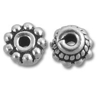 Two silver decorative spacer beads
