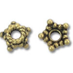 Two antique gold star-shaped spacer beads