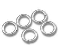 Five silver jump rings for jewelry making