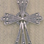 Ornate silver beaded cross pendant