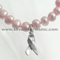 Pink pearl necklace with silver ribbon charm