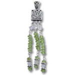 Silver filigree pendant with green bead tassels