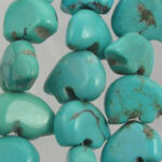 Turquoise heart-shaped beads with natural brown veining