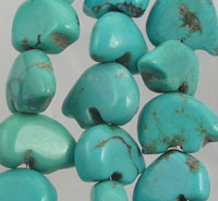 Turquoise heart-shaped beads with natural brown veining