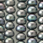 Close-up of iridescent black pearls