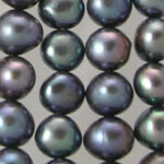 Strands of dark iridescent pearls