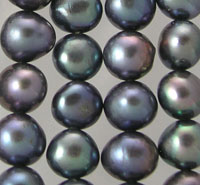 Strands of dark iridescent pearls
