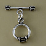 Silver toggle clasp brooch with circular pendant
