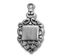 Ornate vintage silver pendant with square centerpiece