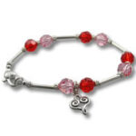Beaded silver bracelet with butterfly charm
