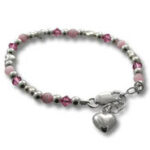 Silver and pink beaded bracelet with heart charm