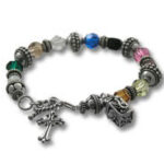 Silver charm bracelet with cross and multicolored beads
