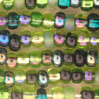 Green iridescent sequin fabric close-up