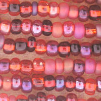 Close-up of pink and red glass beads