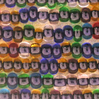 Rows of colorful tiny shoe-shaped trinkets