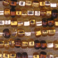 Close-up of gold and amber seed beads