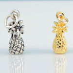 Silver and gold pineapple charm pendants