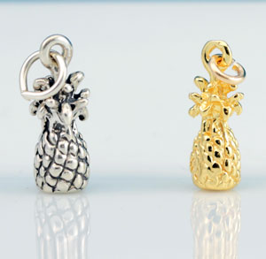 Silver and gold pineapple charm pendants