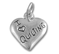 Silver heart charm stamped "I ♥ QUILTING