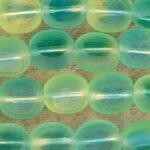Close-up of translucent aqua glass beads