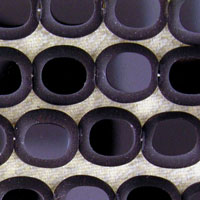 Close-up of purple hollow cylindrical tubes