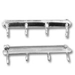 Two silver wall-mounted key racks with hooks