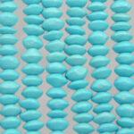 Rows of turquoise oval beads on strings