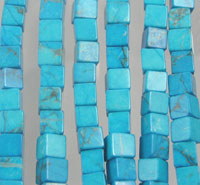Strands of turquoise square beads