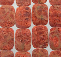 Red textured rectangular beads in grid